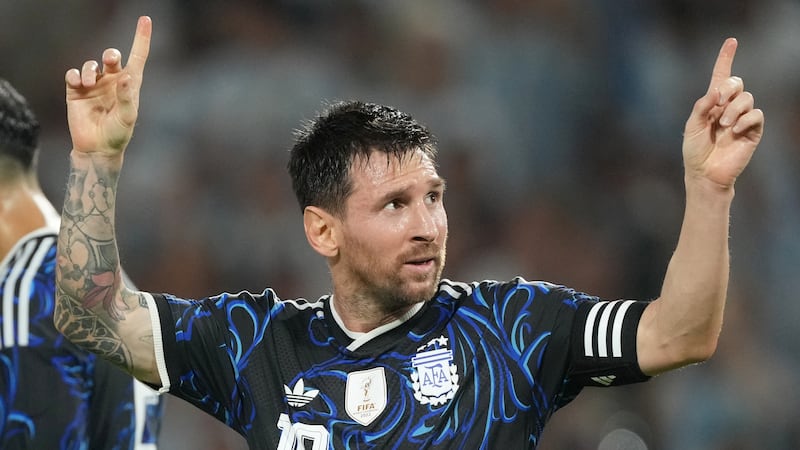 Argentina's Lionel Messi celebrates scoring his side's second goal against Zambia during a...