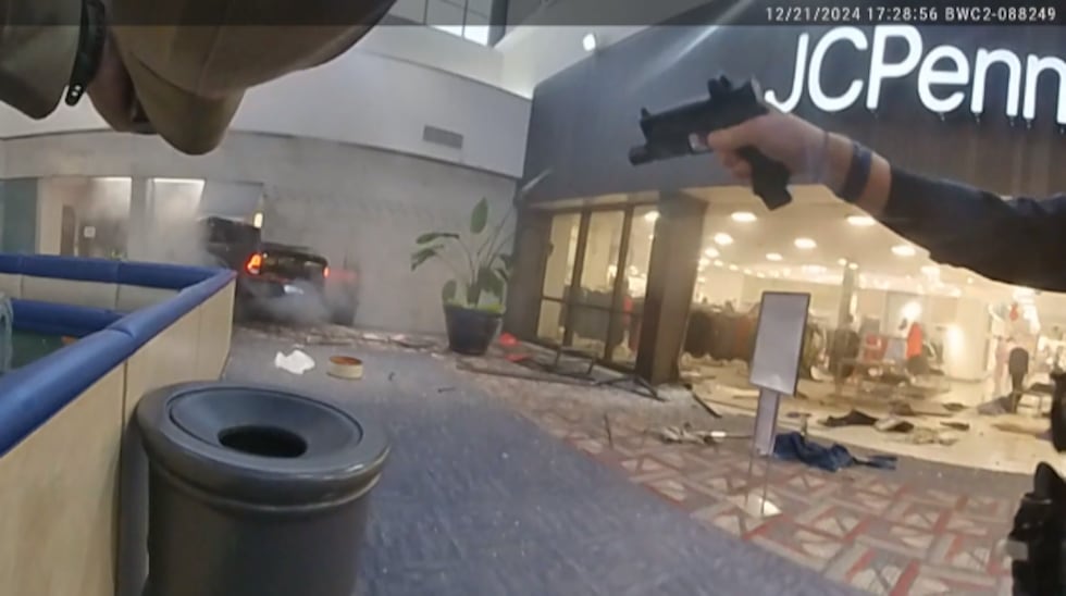 Body camera footage of police shooting at truck after it drove into a mall