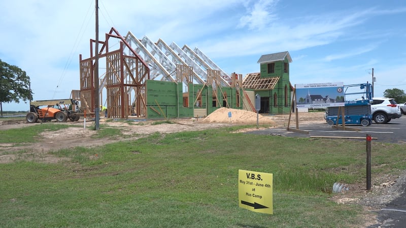 The New Tabor Brethren Church sanctuary being rebuilt after a fire destroyed the old building.