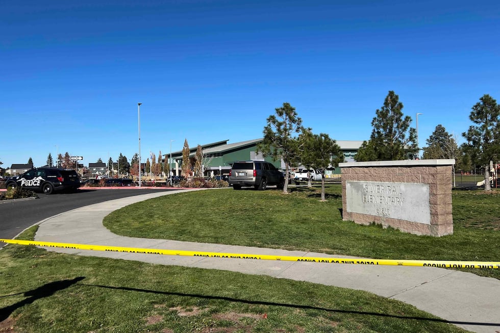 Police tape is placed outside Silver Rail Elementary school, where a shooting took place, on...