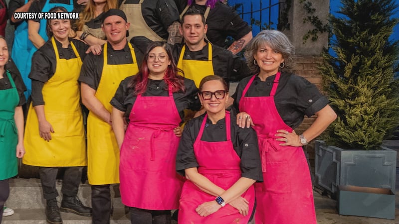 Lilian Halabi appears on far right in pink apron.
