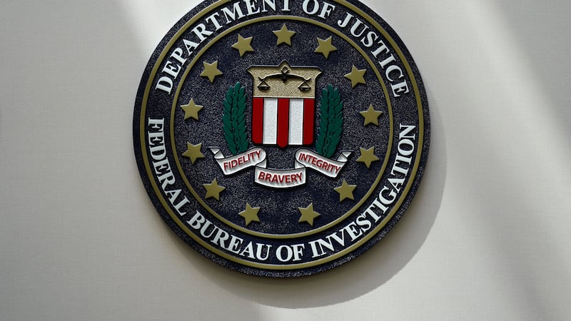 FILE - An FBI seal is seen on a wall on Aug. 10, 2022, in Omaha, Neb.