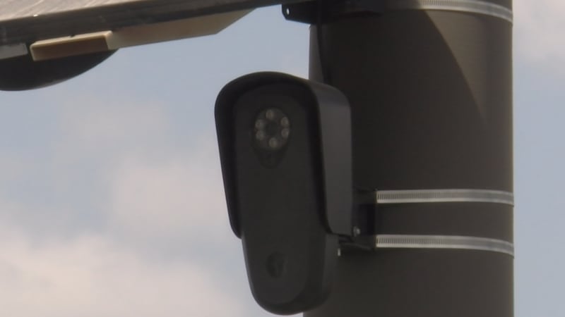 A Flock camera seen in a Beckley parking lot