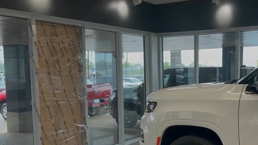 The Patterson Dodge dealership said the only damage to their facility was the broken window,...