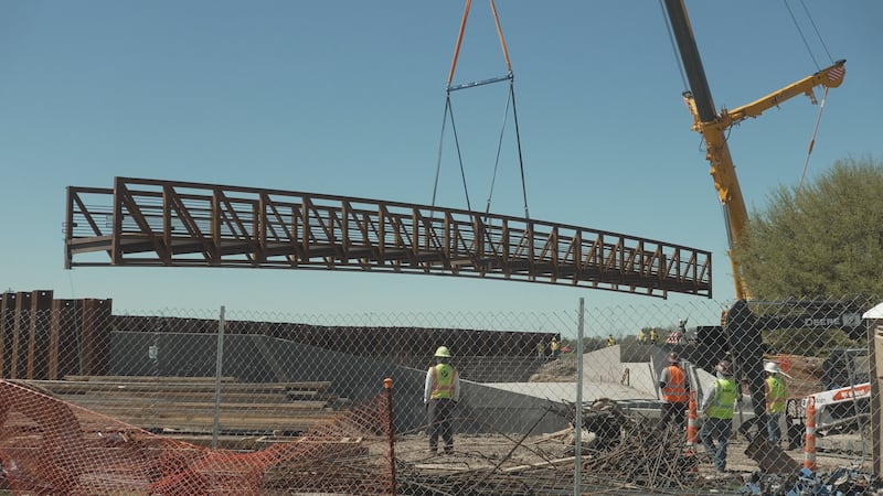 140-foot bridge installed at Travis Midtown Park this morning into the afternoon.