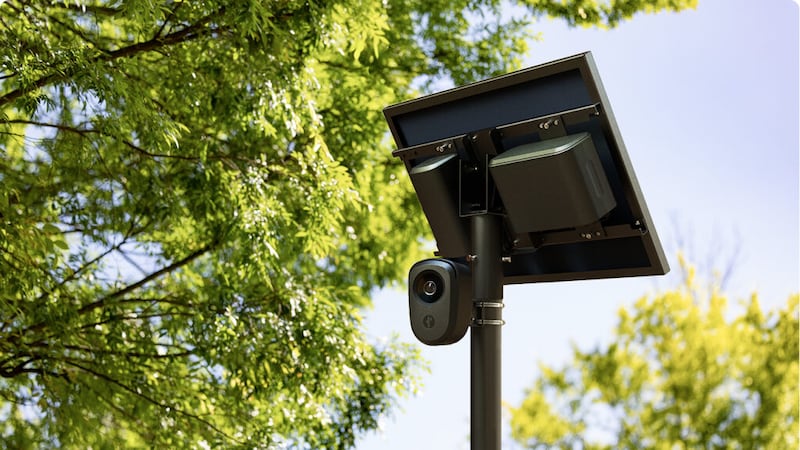 Flock Safety license plate readers are typically mounted on tall poles, with a camera and...