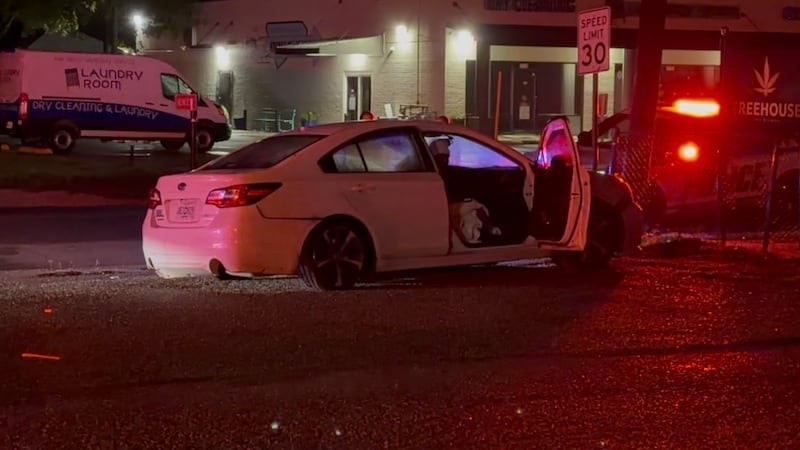 Police investigate crash at Dominoes Pizza