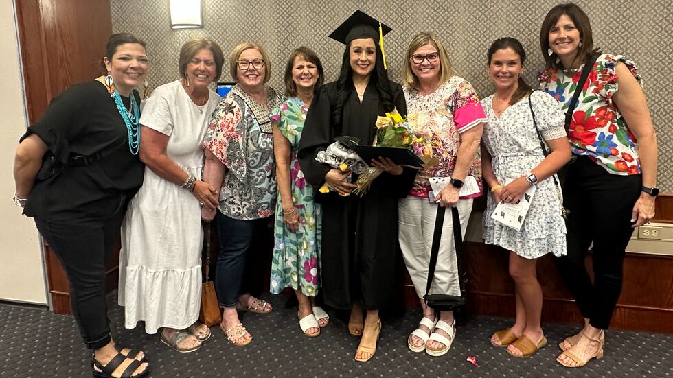 Longtime elementary school custodian becomes teacher at the same school after earning her GED