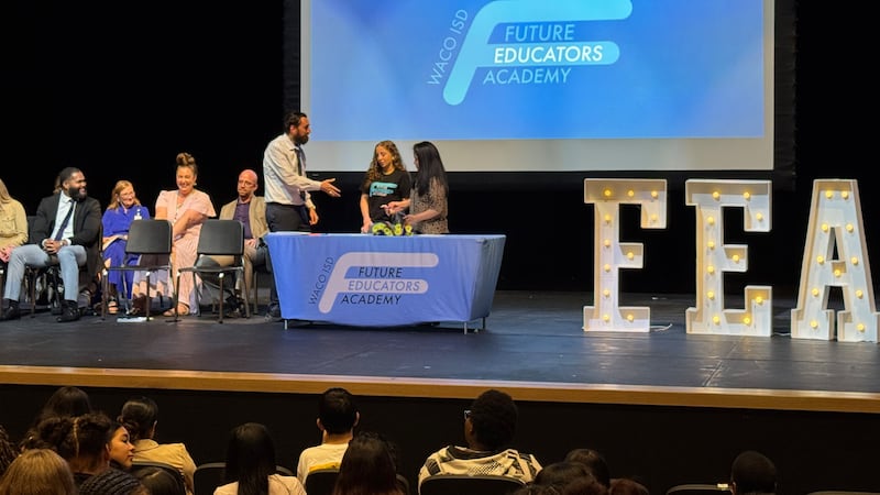 Future Educators Academy’s first graduating received certificates recognizing completion of...