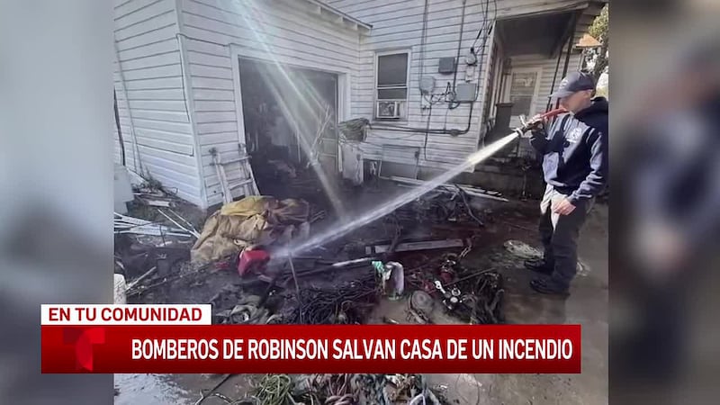 El Departamento de Bomberos de Robinson responde a un incendio en una entrada de vehículos en...